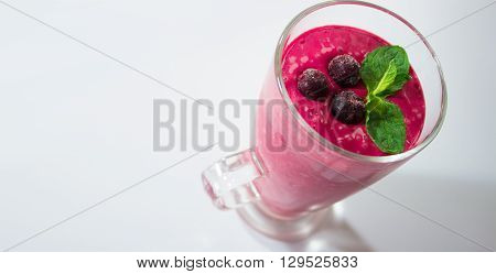 Frozen black currant berries smoothie with mint
