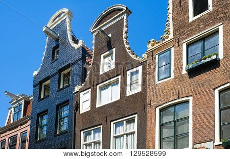 Amsterdam. upward view of the traditional houses in Spiegelkwartier
