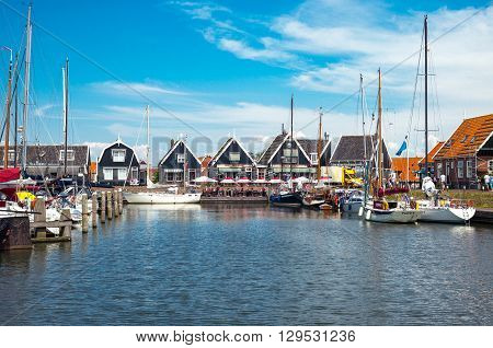 Marken Holland - July 24 2014: Waterland district boats in the little harbour of the village