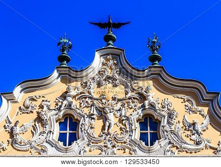 Wuerzburg- the Haus zum Falken -next to the Marienkapelle- with the original curved gables is one of the most beautiful rococo facades throughout southern Germany.