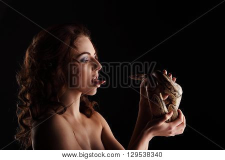 Sexy Brunette Girl With Orange Python Around Her Neck