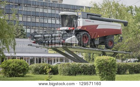 ROSTOV-ON-DON RUSSIA- MAY 11- Combine harvester on a pedestal on May 11 2016 in Rostov-on-Don