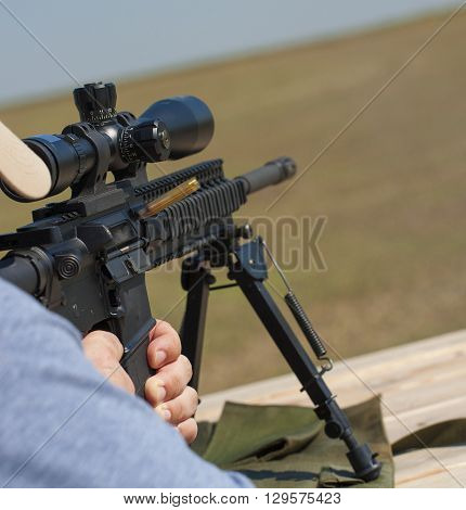 Moment after a shot has been taken and brass is flying out 