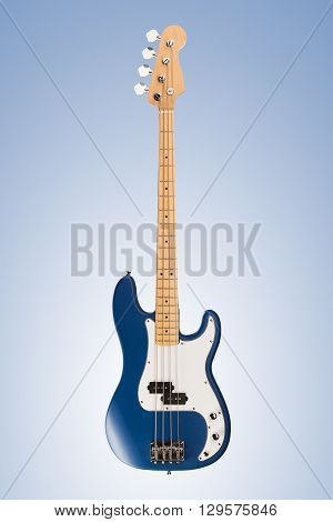 Blue matte four string bass guitar on neutral background