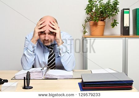 no way out for desperate manager. He holds his head with both hands