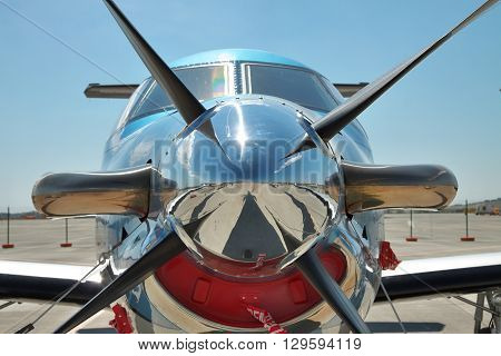 Gelendzhik Russia - September 10 2010: Pilatus PC-12 light turboprop passenger plane on the apron in the airport - front view closeup