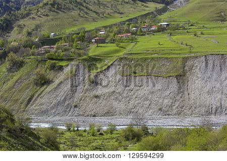 Mountain landscape in Georgia Kaukaz with beautiful sky