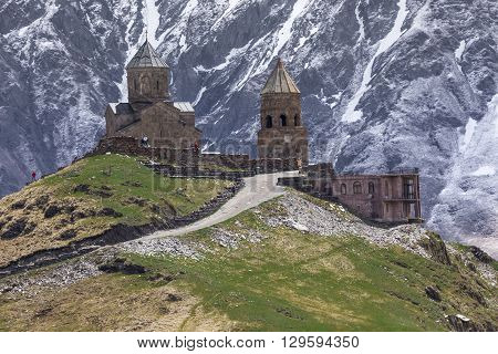 Georgia, Stepantsminda-sameba. Ancient Gergeti Trinity Church High In The Mountains.
