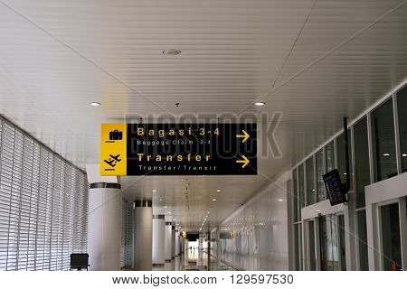 the sign of baggage claim in the airport