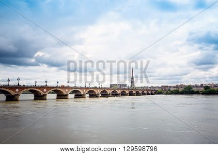 Bordeaux river bridge with St Michel cathedral, France