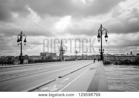 Bordeaux river bridge with St Michel cathedral, France