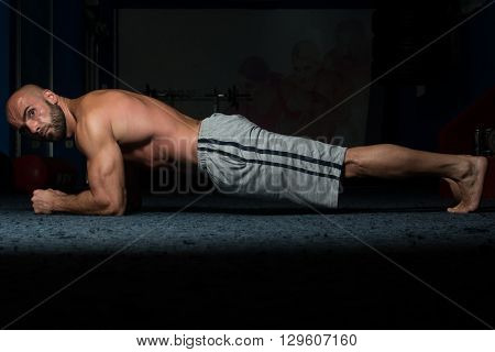 Healthy Man Doing Abdominal Excerise On Foor