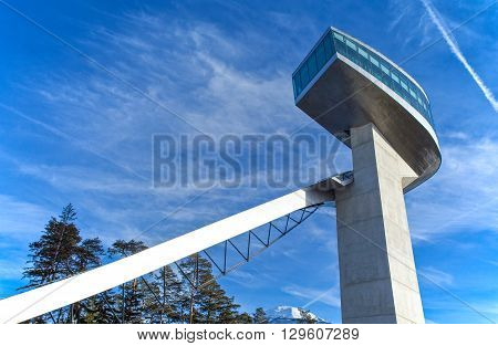 Innsbruck Austria - February 8 2010: Upward view of the tower of the Bergisel skijamping stadium