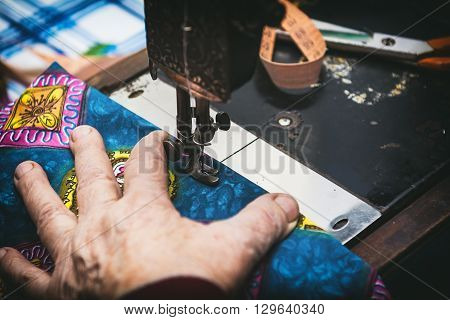 Old vintage hand sewing machine. Selective focus