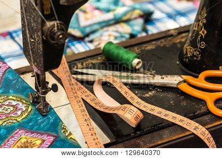 Old vintage hand sewing machine. Selective focus