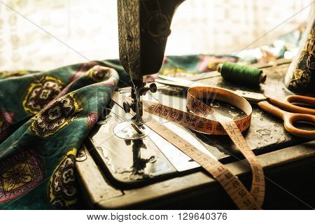 Old vintage hand sewing machine. Selective focus