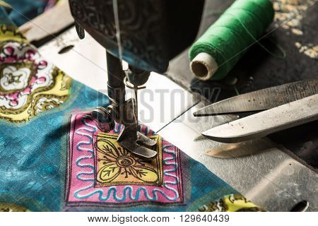 Old vintage hand sewing machine. Selective focus