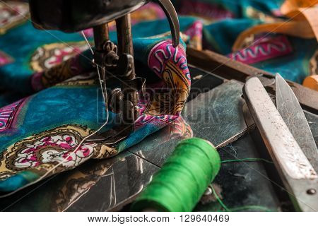 Old vintage hand sewing machine. Selective focus