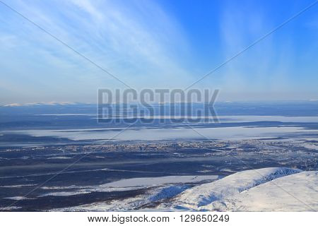 Apatity town and lake in russian arctic