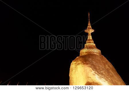 Kyaikhtiyo Or Kyaiktiyo Pagoda At Dusk In Myanmar. They Are Public Domain Or Treasure Of Buddhism, N