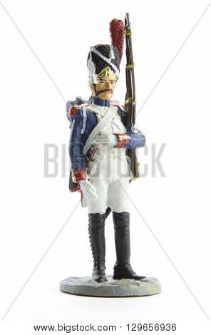 Tin Soldier on a stand on a white background