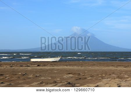 fishing boat on the background of the lake Nicaragua and volcano Concepcion.