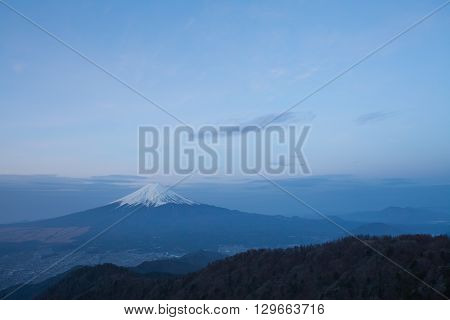 Mountain Fuji and Fujiyoshi town in spring season seen from Mountain Mitsutoge