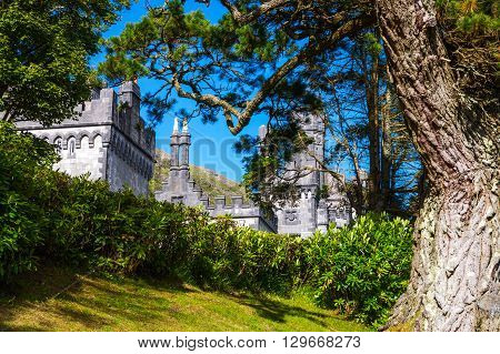 Calway Ireland - August 4 2013: Connemara area the Kylemore abbey on the Pollacappul lake