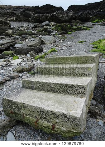 Beach Steps And Cliffs Seascape Photographed At Looe In Cornwall
