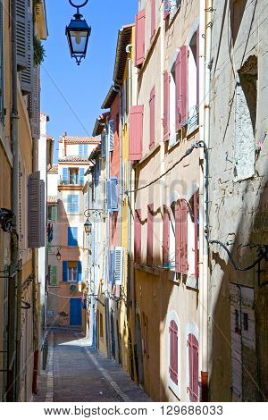 Marseille France - April 29 2006: Colored houses of a alley in the old district Le Panier