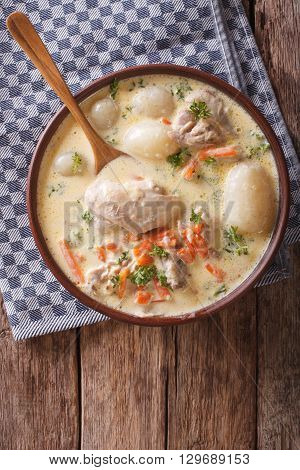 Creamy Soup With Chicken And Vegetables Close Up. Vertical Top View