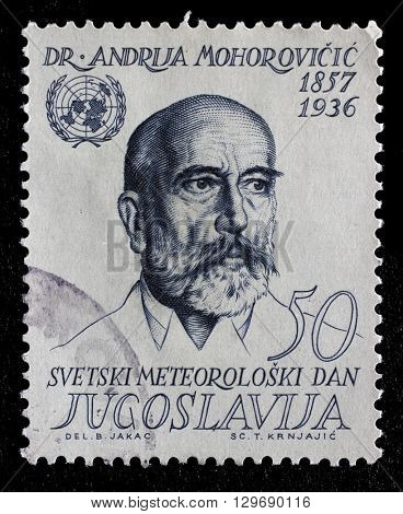 ZAGREB, CROATIA - JUNE 14: Stamp printed in Yugoslavia shows Andrija Mohorovicic Croatian meteorologist and seismologist, circa 1963, on June 14, 2014, Zagreb, Croatia