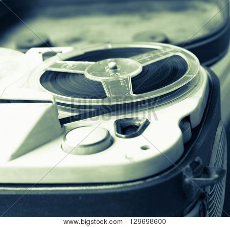 Old portable reel to reel tube tape-recorder. Portable reel tape recorder. Close up.