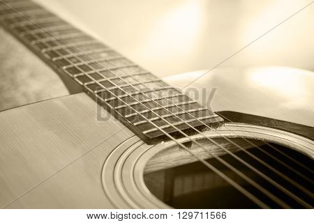 Close up acoustic guitar detail vintage filter, stock photo