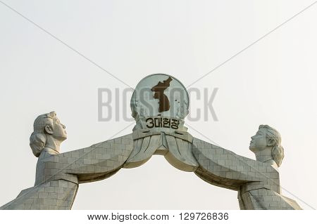 PYONGYANG NORTH KOREA - July 2014: Arch of Reunification Monument to the Three Point Charter for National Reunification in Pyongyang North Korea