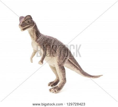 side view brown Dilophosaurus toy on a white background