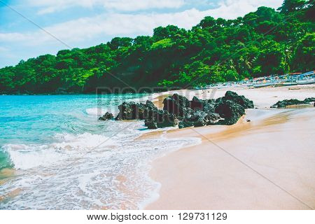 Beautiful beach clear water of Indian ocean at sunny day. Bali Indonesia