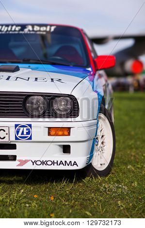 KYIV UKRAINE - April 22 2016: Car BMW e30 M3 at festival of vintage cars OldCarLand-2016 in Kiev. Side view in front.
