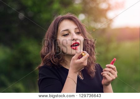 Beautiful Curly Girl In The Woods