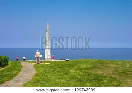 Arromanches France - May 23 2012: Normandy tourists in the memorial areai of the second World War landing.
