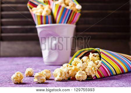 Homemade crunchy caramel popcorn ready for use. Selective focus.
