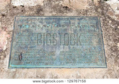 KNYSNA SOUTH AFRICA - MARCH 5 2016: Memorial plaque next to the Diep River bridge for the builder of the Prince Alfred Pass Thomas Charles John Bain