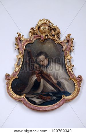 URSBERG, GERMANY - JUNE 09: Saint Aloysius painting in the monastery church of St. John in Ursberg, Germany on June 09, 2015.