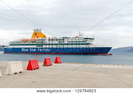 Santorini, Greece - May 2, 2016: The big sea ferry is moored off in the port of Athinios on the island of Santorini. Sea ferries make regular flights between the Greek islands.