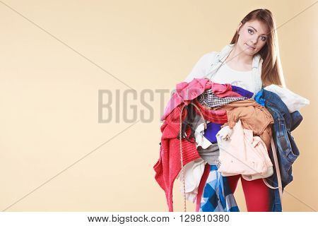 Woman Carrying Dirty Laundry Clothes.