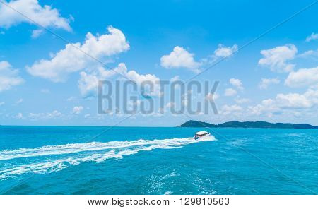 Trail on sea water surface behind  boat
