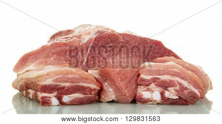 Fragments of fresh raw pork meat isolated on white background.