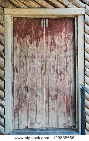 Old scratched wooden vintage door texture background
