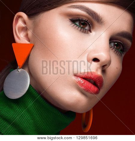 Pretty fresh girl, fashionable image of modern Twiggy with unusual eyelashes and bright accessories. Photos shot in studio