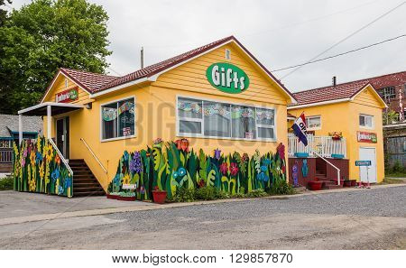 GANANOQUE CANADA - 18TH MAY 2015: The outside of a Gift Shop in Gananoque during the day